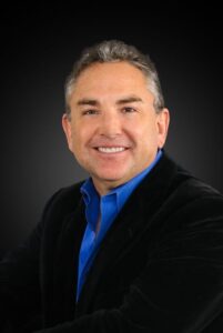 A professional headshot of Jonathan Duncklee, President of Duncklee Inc. Heating and Cooling, featured in an article discussing his company's history, ductless technology, and commitment to serving HVAC customers in Connecticut.