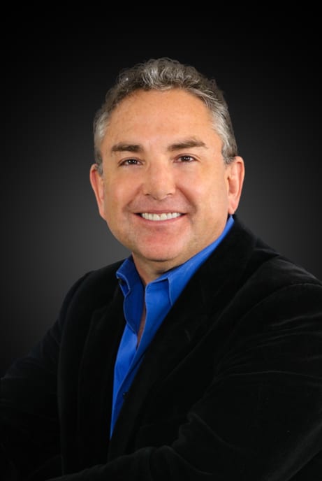 A professional headshot of Jonathan Duncklee, President of Duncklee Inc. Heating and Cooling, featured in an article discussing his company's history, ductless technology, and commitment to serving HVAC customers in Connecticut.