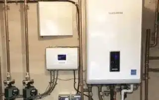 Wall-mounted tankless water heater installation