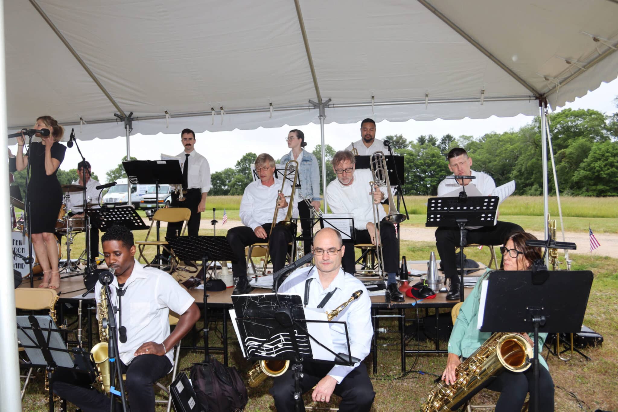 Anniversary Party Band Stonington CT Musicians playing instruments during the Duncklee Cooling and Heating 50th anniversary in Stonington, CT.