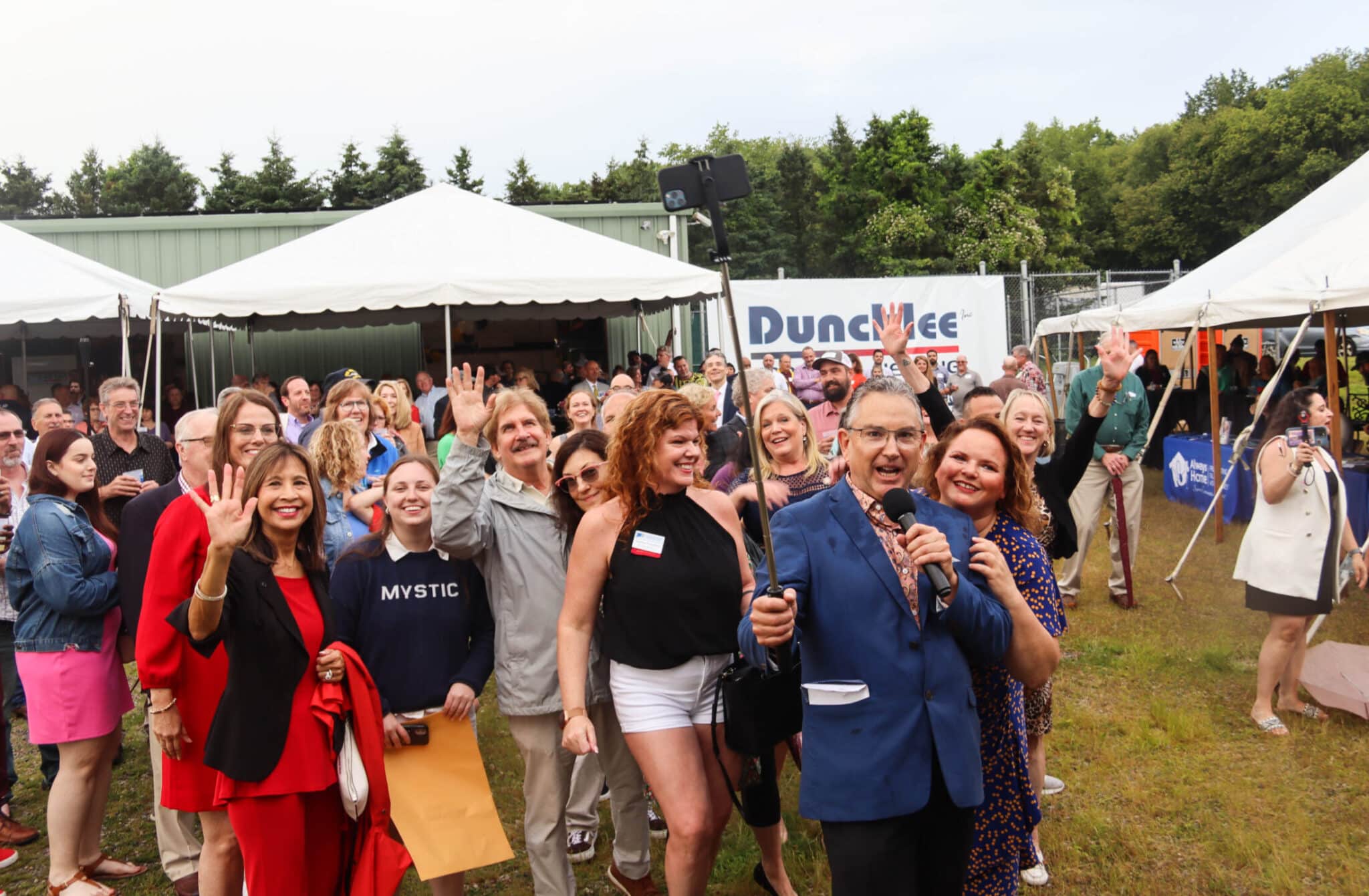 Community Gathering Duncklee 50 Years Mystic A large crowd of local residents gathering to celebrate 50 years of Duncklee Cooling and Heating in Mystic, CT