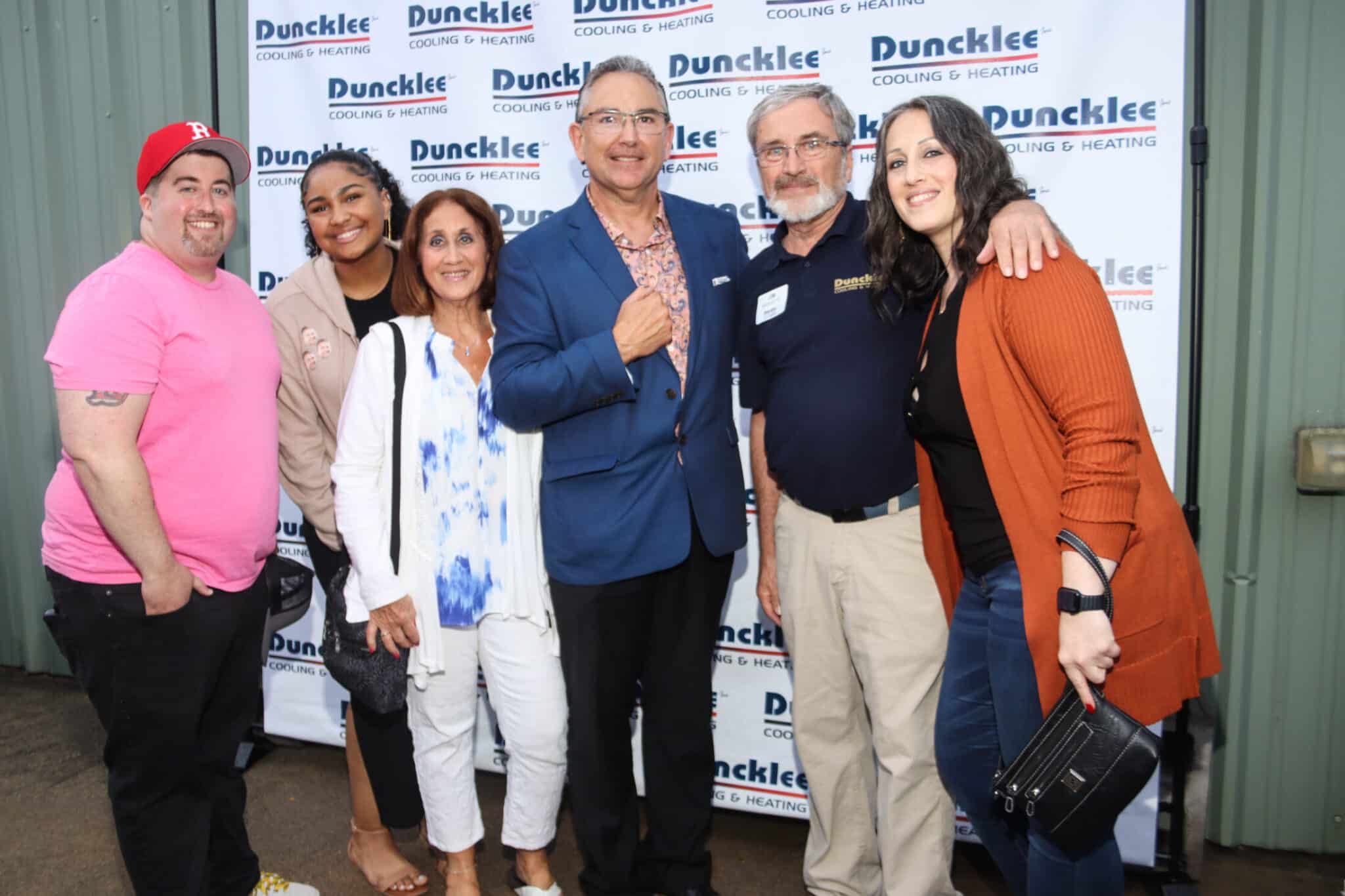 Duncklee Anniversary Smiles Mystic Smiling guests and employees at the Duncklee Cooling and Heating 50th anniversary in Mystic, CT