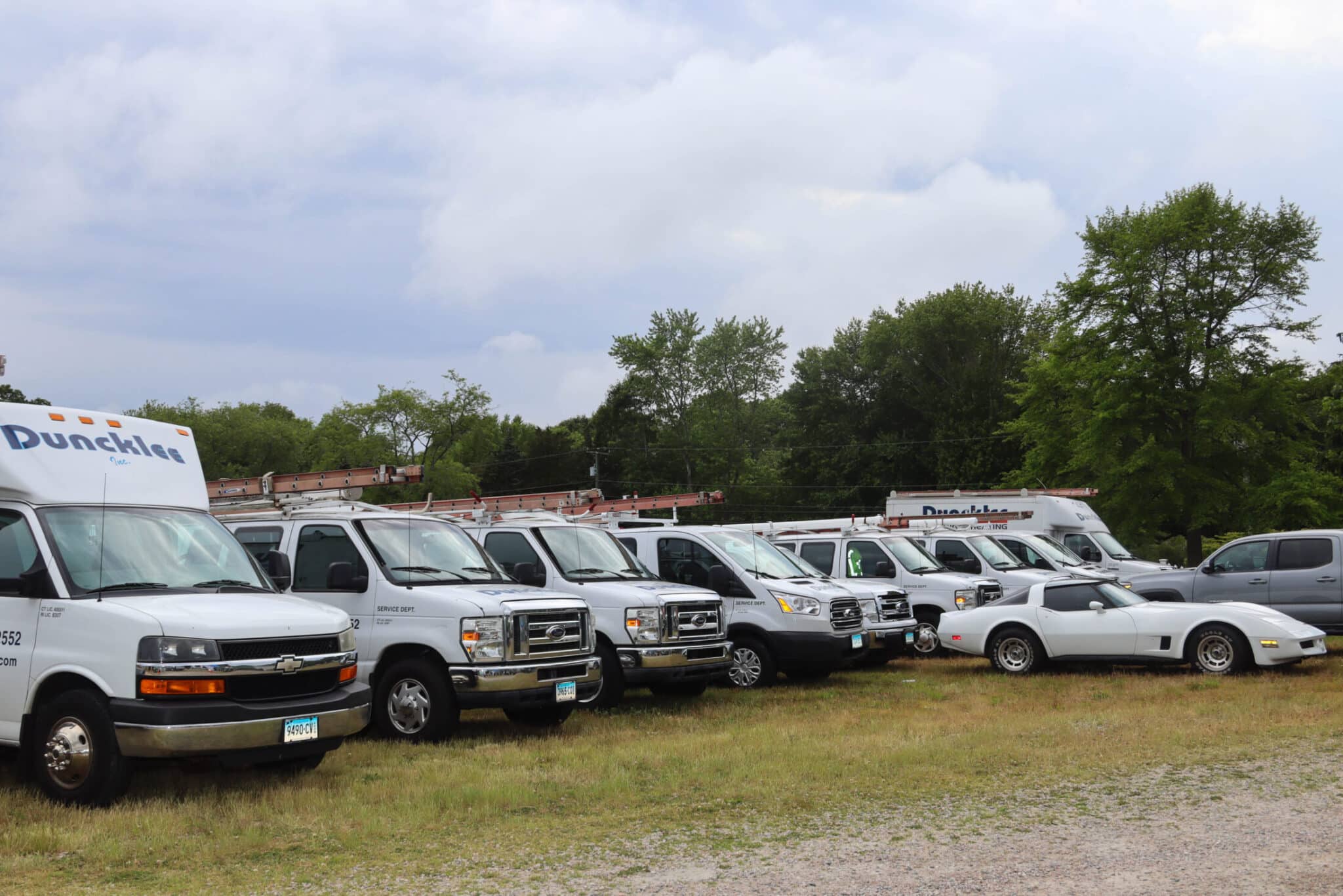 Duncklee Service Fleet Stonington CT A row of Duncklee Cooling and Heating service trucks parked in Stonington, CT.