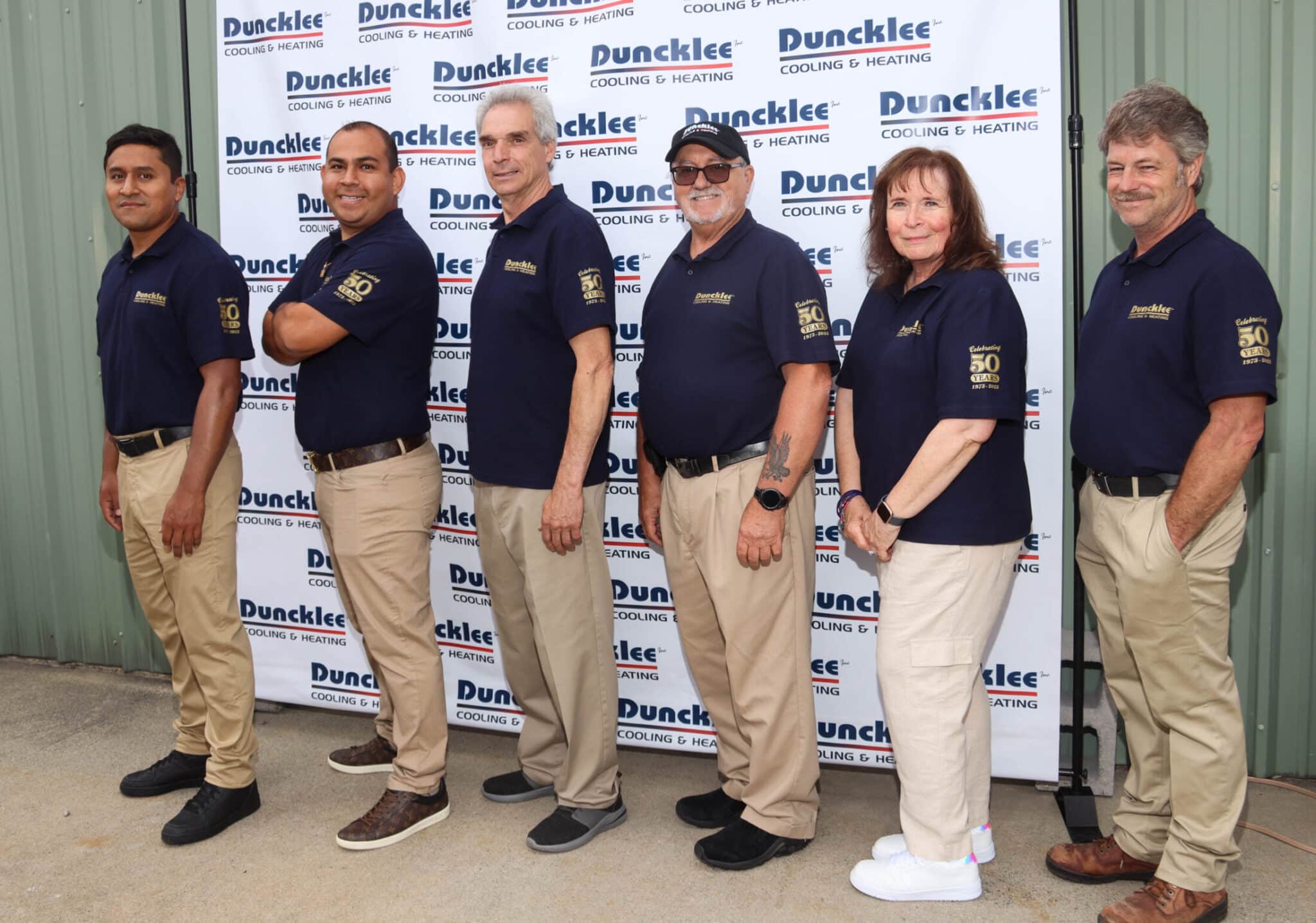 Duncklee Service Technicians Stonington A group of Duncklee Cooling and Heating service technicians posing together in Stonington, CT