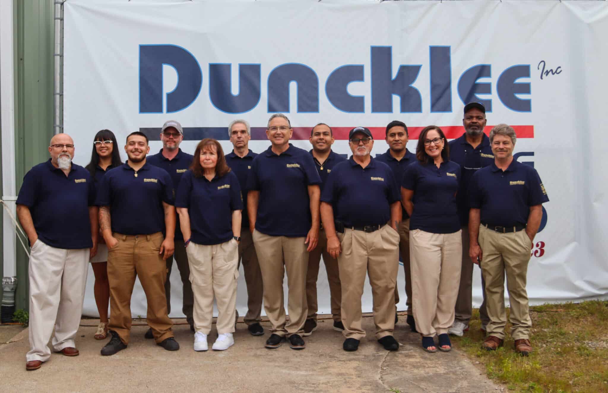 Duncklee Team Photo Mystic CT The entire Duncklee Cooling and Heating team posing for a group photo in Mystic, CT
