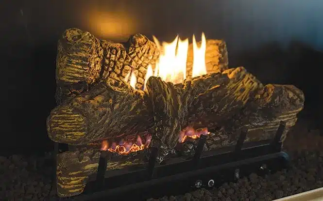 gas-logs-realistic-fireplace-connecticut Gas fireplace with realistic logs and flames burning brightly